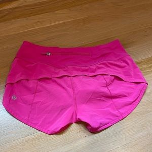 Lululemon 2.5” size 2 sonic pink speed ups